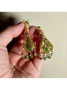 Ornate faceted green glass and gold clip on earrings